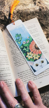 Printed, laminated bookmark, book mark, peeping tom cat bookmark.