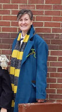 happy customer in a newt scarf