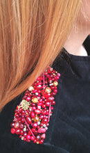 red and gold beaded jacket