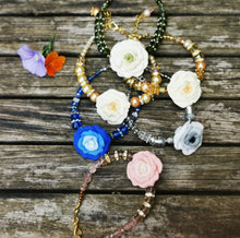 Corsage bracelet, stunning handmade  polymer clay roses with crystals and gems.