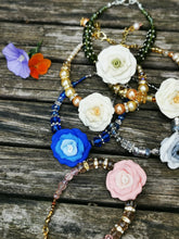 Corsage bracelet, stunning handmade  polymer clay roses with crystals and gems.