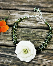 Corsage bracelet, stunning handmade  polymer clay roses with crystals and gems.