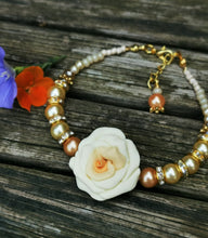 Corsage bracelet, stunning handmade  polymer clay roses with crystals and gems.