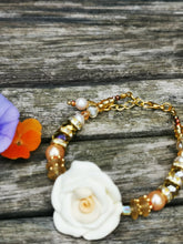 Corsage bracelet, stunning handmade  polymer clay roses with crystals and gems.