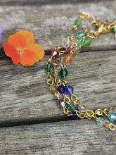 Harlequin: Stunning, hand wired triple stranded Swarovski crystal bracelet in 4 colour choices of metal