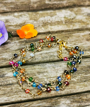 Kaleidoscope: Stunning, hand wired triple stranded Austrian crystal bracelet in 3 colour choices of metal