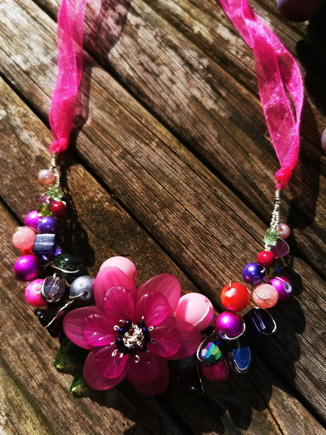 Symphony necklaces: hand wired, necklace with polymer clay roses and flowers