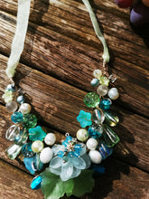 Symphony necklaces: hand wired, necklace with polymer clay roses and flowers