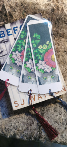 Printed, laminated bookmark, book mark, peeping tom cat bookmark.