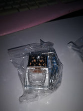 silver topped car air freshener