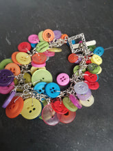 button filled cluster charm bracelet