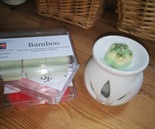 Sweet and simple, plain white ceramic wax burner.