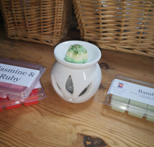 Sweet and simple, plain white ceramic wax burner.