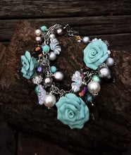 Sea Sprite: Handmade cluster charm Bracelet, with handmade polymer clay roses, 7.5 inches