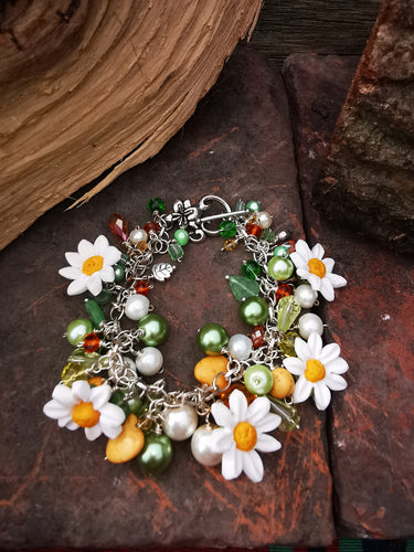 Daisy Chain, cluster charm bracelet with handmade polymer clay daises, 7.5 inches.