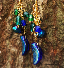 Ephemera: long drop earrings with gold plated fixings and AB coated  cobalt blue leaves,