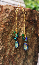 Ephemera: long drop earrings with gold plated fixings and AB coated  cobalt blue leaves,