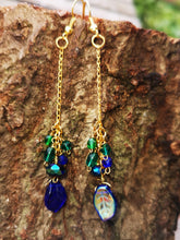 Ephemera: long drop earrings with gold plated fixings and AB coated  cobalt blue leaves,