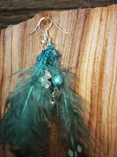 Float on, delicate feathered earrings with crystals and beads,