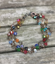 Harlequin: Stunning, hand wired triple stranded Swarovski crystal bracelet in 4 colour choices of metal