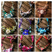 Symphony necklaces: hand wired, necklace with polymer clay roses and flowers
