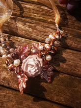 Symphony necklaces: hand wired, necklace with polymer clay roses and flowers