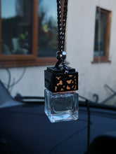 black filigree topped car scent diffuser
